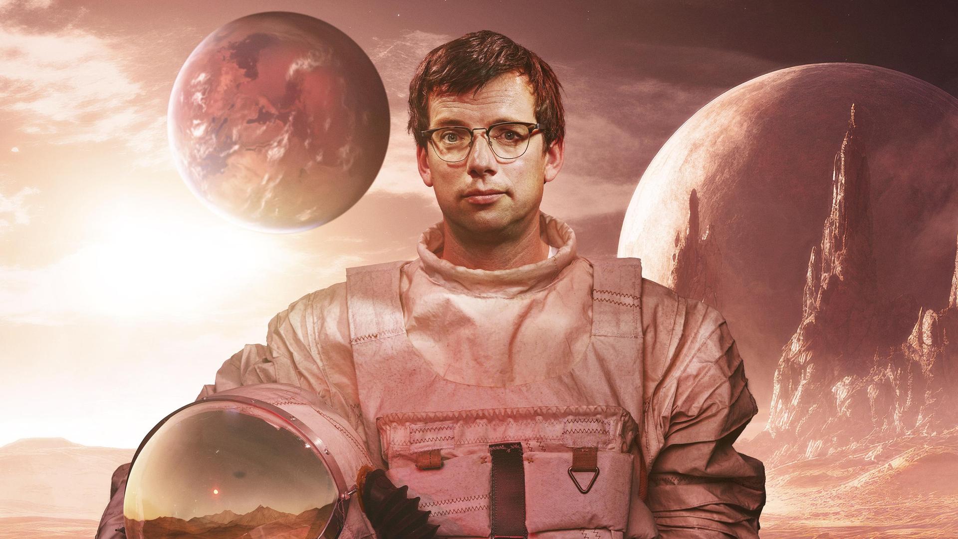 Pieter Derks, Promotiefoto van Pieter in ruimtepak tussen de planeten