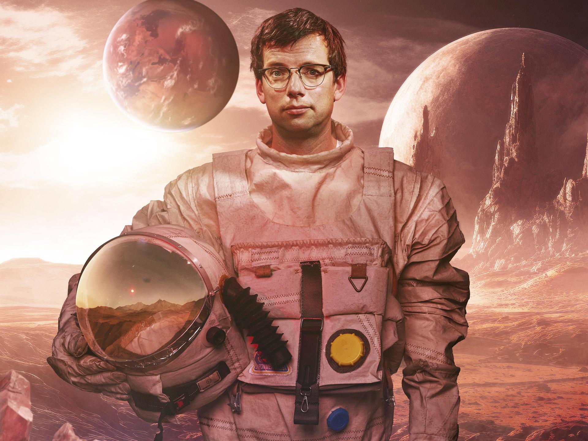 Pieter Derks, Promotiefoto van Pieter in ruimtepak tussen de planeten